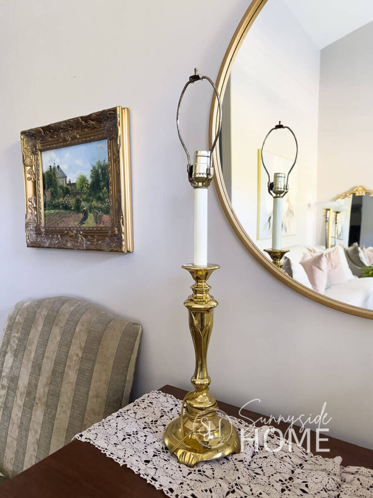 Thrifted 90's shiny brass lamp base before makeover with antique brass finish.