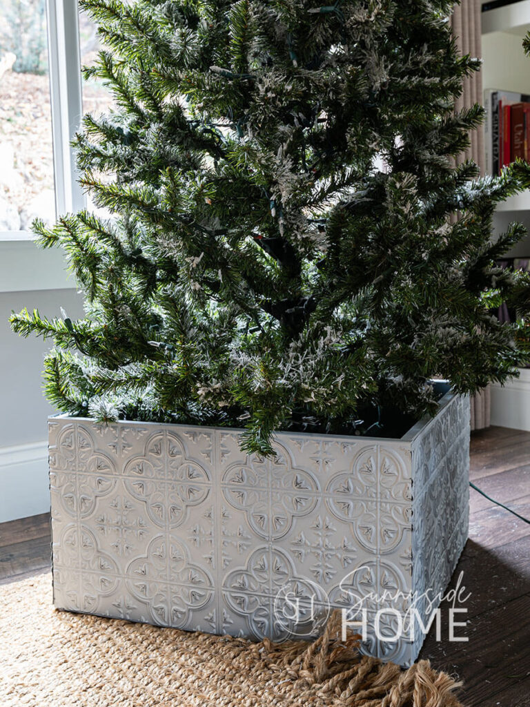 Finished Christmas tree collar using Dollar Tree Tiles.