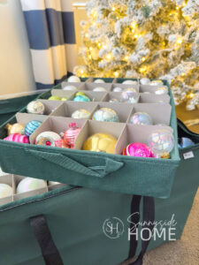 A canvas tray sorts and organizes Christmas ornaments and then stores in a large canvas bag.