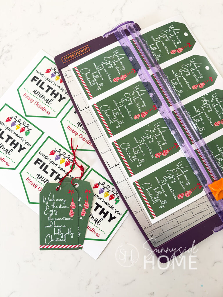 Neighbor Christmas gift tags and a paper trimmer.