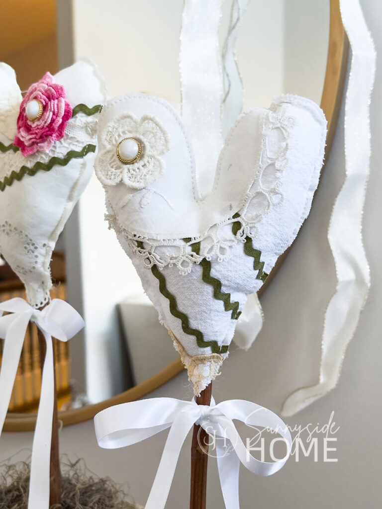 DIY Valentine heart decor made with vintage linens, lace and trims.