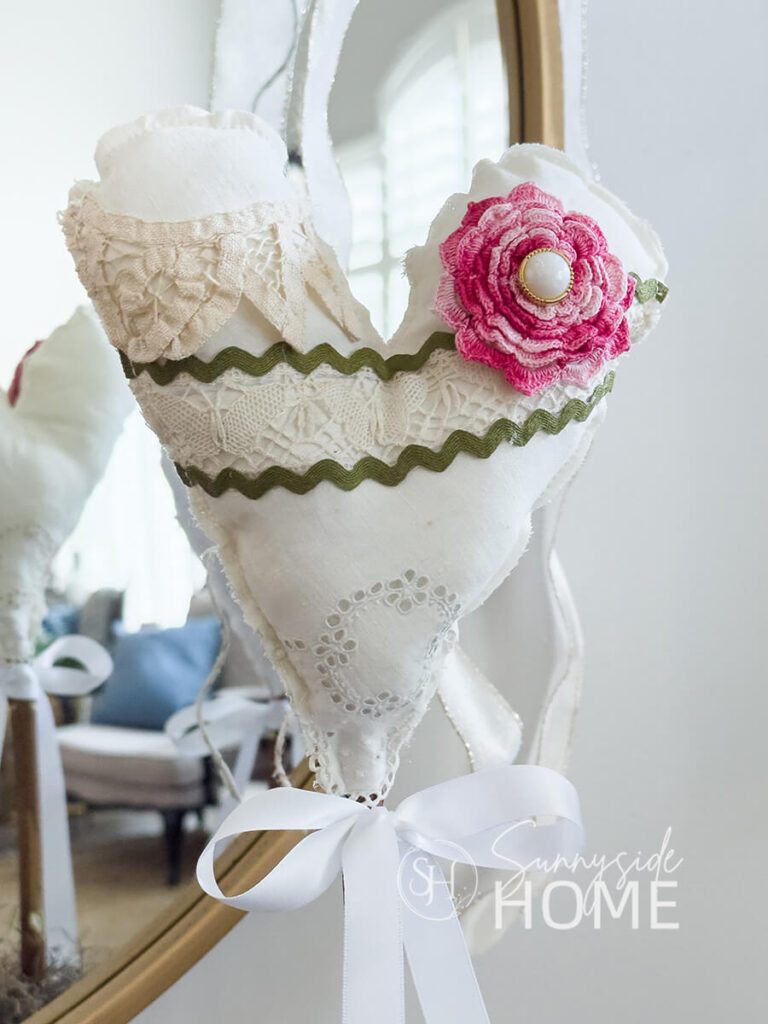 DIY Valentine heart decor made with vintage linens, lace and trims.