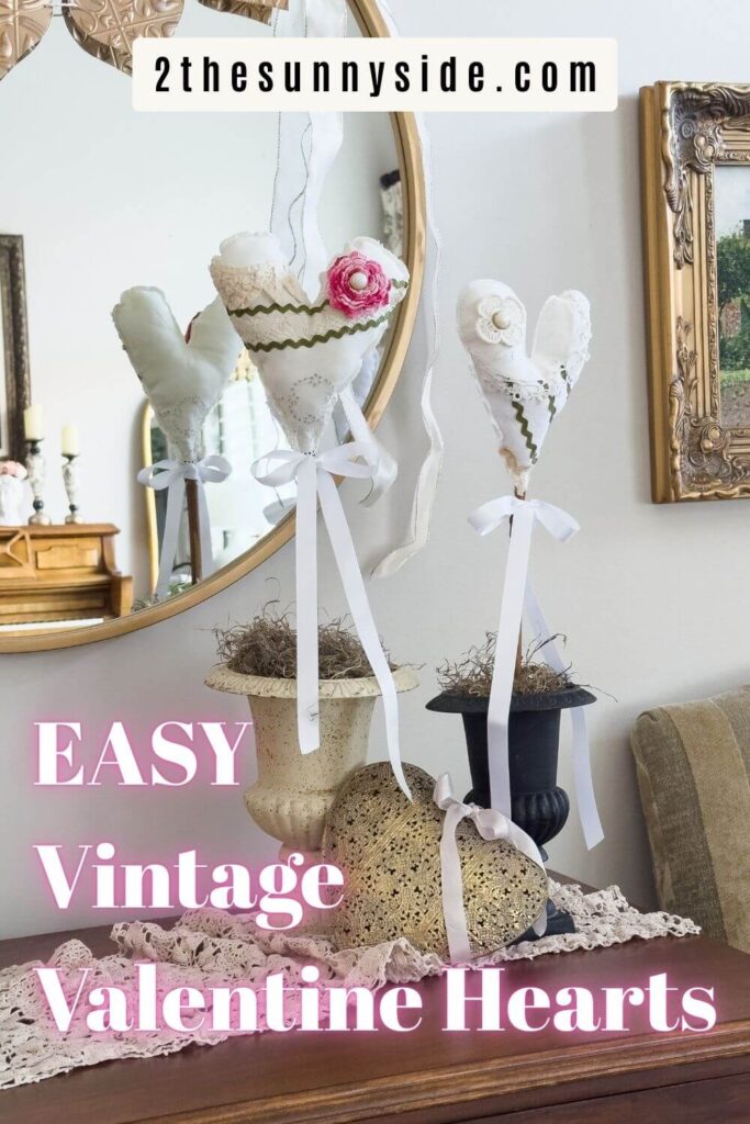Pinterest image of styled DIY Valentine Heart decor using Vintage Linens and Lace.