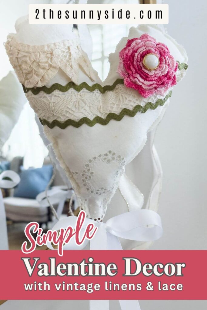 Pinterest image of styled DIY Valentine Heart decor using Vintage Linens and Lace.
