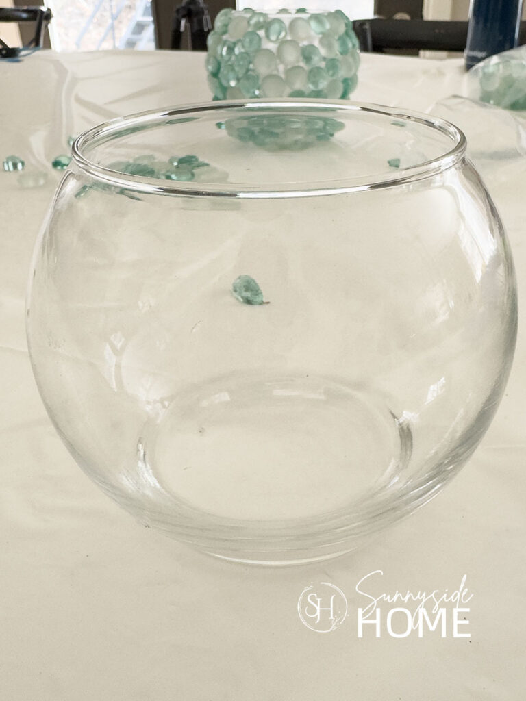 Dollar store round glass vase.