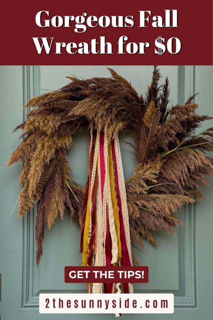 Pinterest image a gorgeous fall wreath for $0 using roadside pampas grass, hung on a blue door.