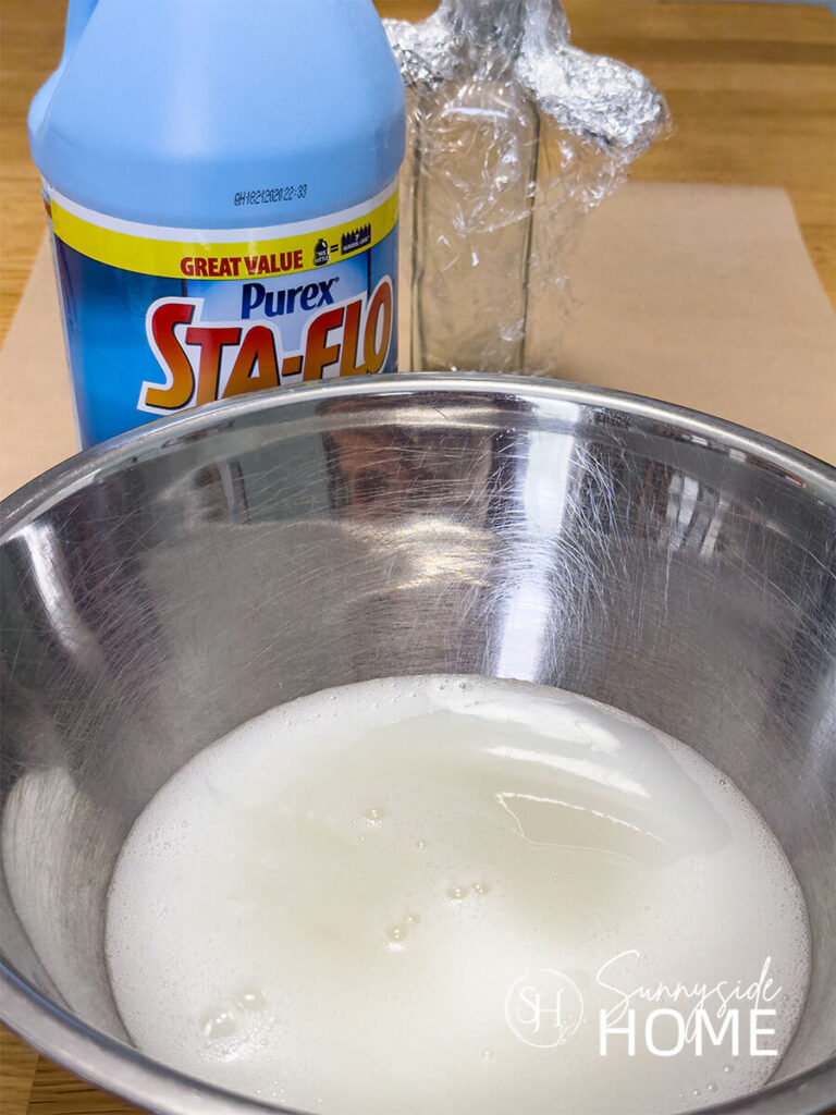 A stainless steel filled with fabric starch.